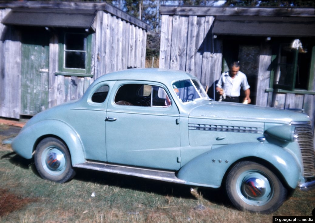 Old car and huts