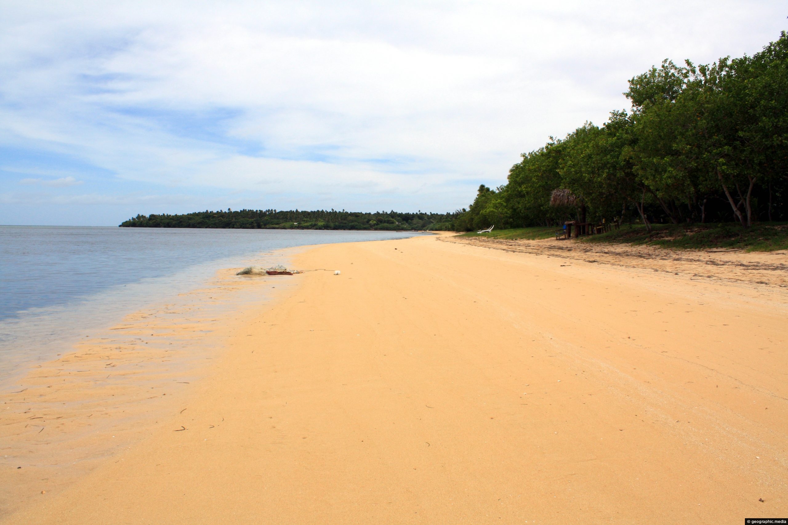 Orange sand on Atata Island in Tonga