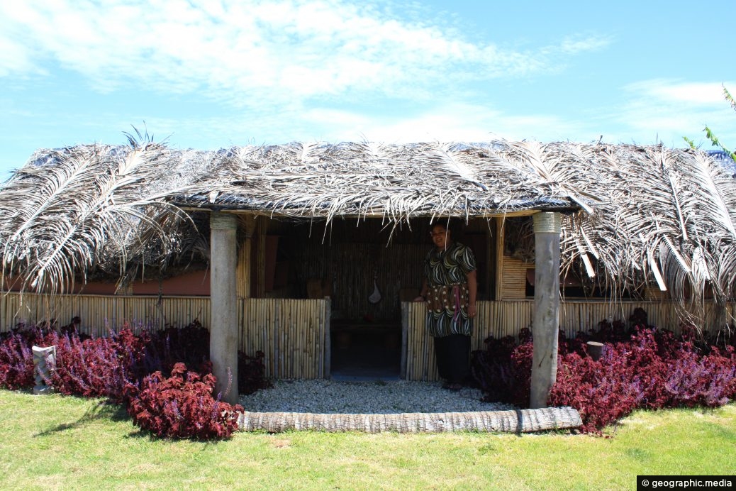 Fale entrance and lady in Old Tonga