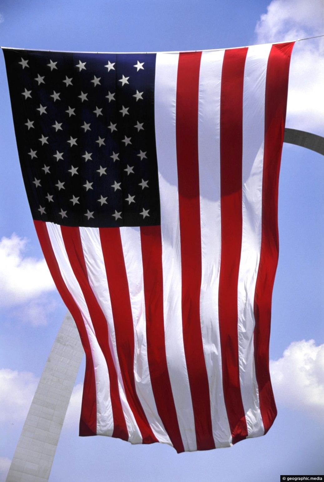 US Flag and Gateway Arch St Louis